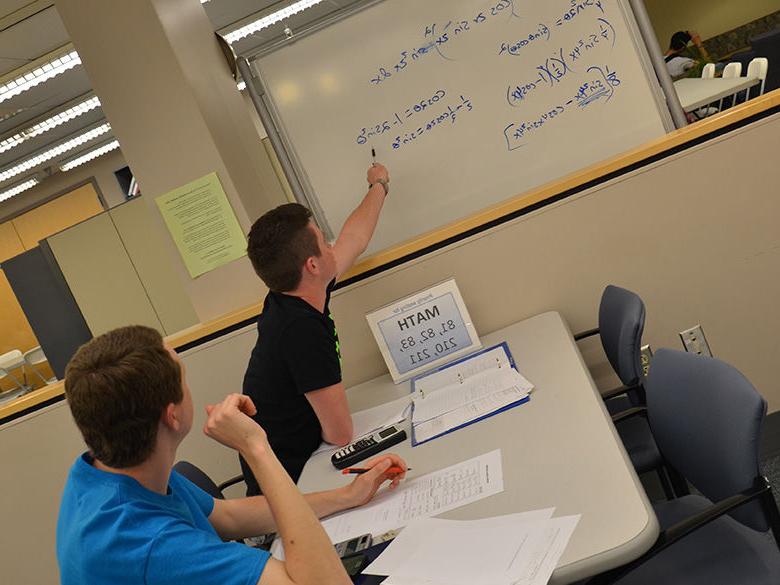 Photo of students working at the Learning Resource Center